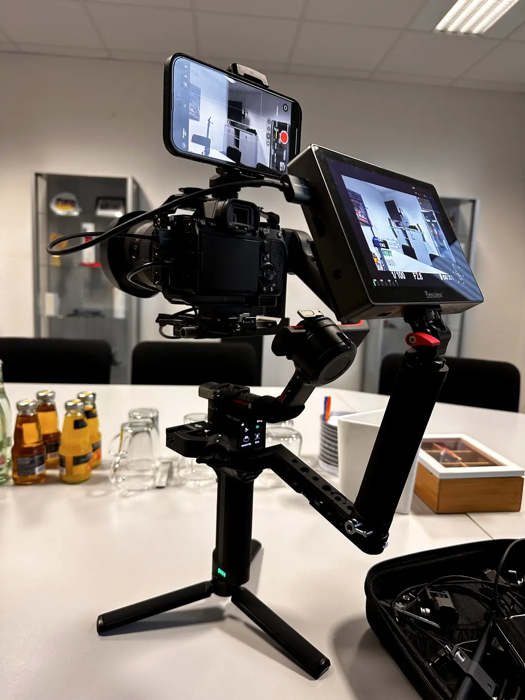Gimbal rig with smartphone and monitor for an office interview