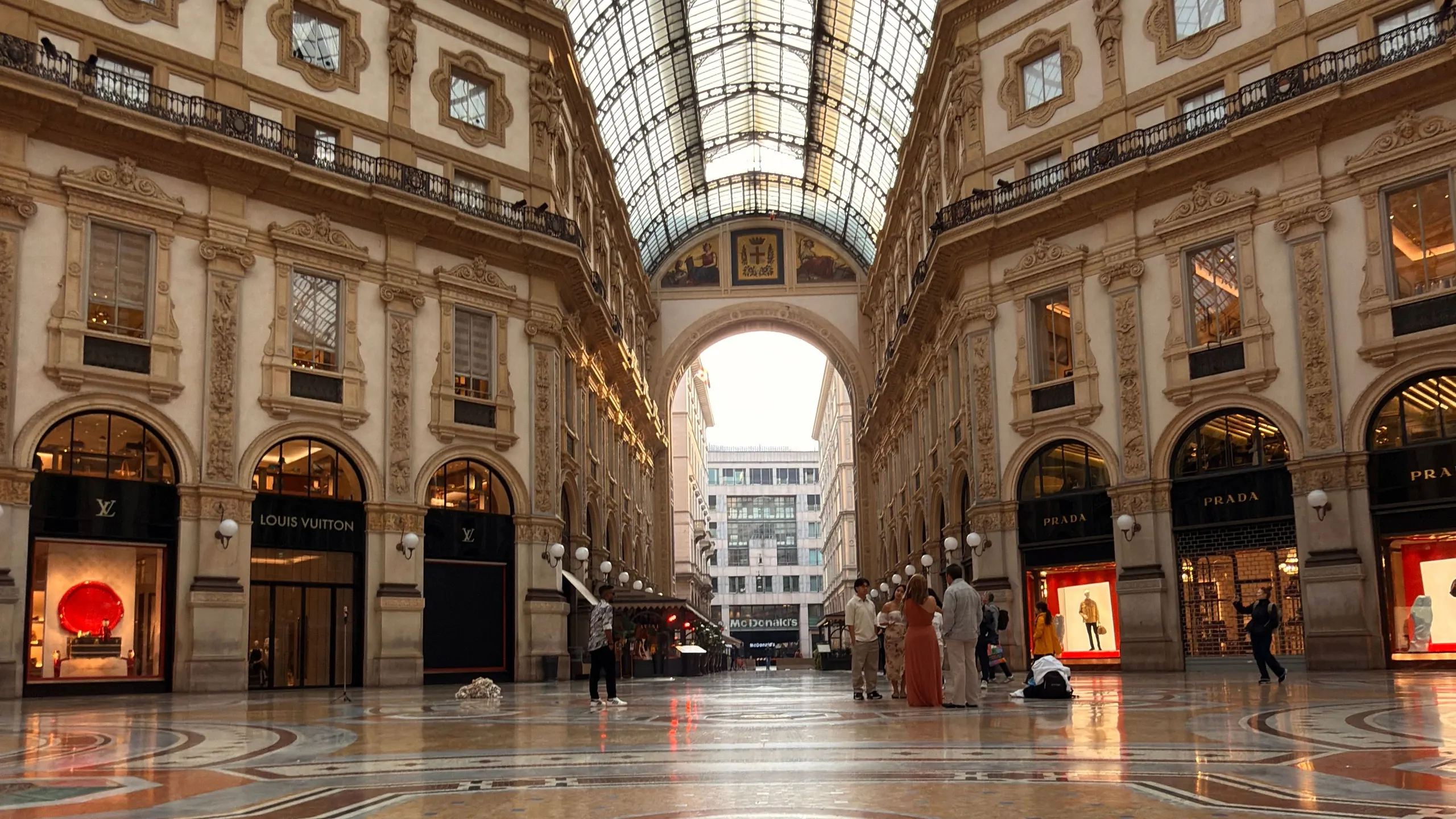 Galleria Vittorio Emanuele II with its glass dome and mosaic floor, almost empty